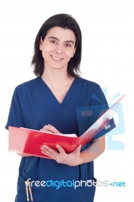 Doctor Making A Note Stock Photo