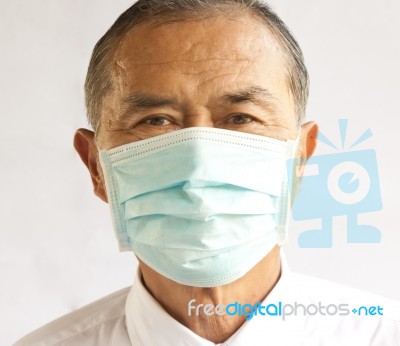 Doctor With Face Mask Stock Photo