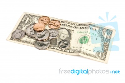 Dollars And Coins Stock Photo