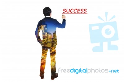 Double Exposure Of City And Businessman With Pen, Business Success Concept Stock Photo