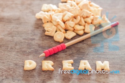 Dream Alphabet Biscuit On Wooden Table Stock Photo