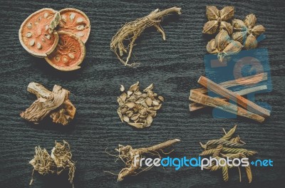 Dried Herbs And Ginseng, Top View Of Thai Herbs And Ginseng On Wooden Floor Stock Photo