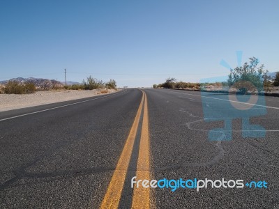 Driving Through The Desert Stock Photo