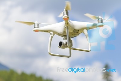 Drone Flying Above Mountains Stock Photo