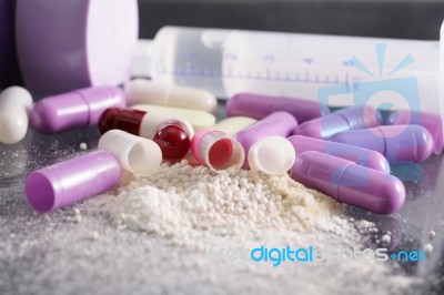 Drug Syringe And Pills With Cocaine And Heroin Spoiled Stock Photo