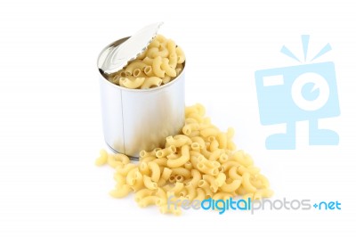 Dry Macaroni From Tin Can On White Background Stock Photo