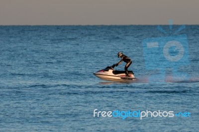 Dungeness, Kent/uk - December 17 ; Man Riding A Jet Ski Off Dung… Stock Photo