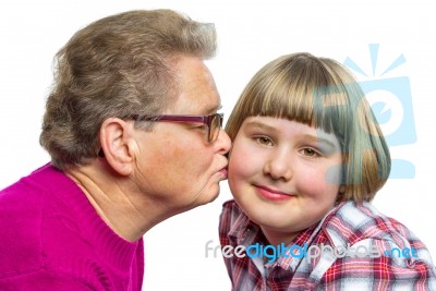Dutch Grandmother Kisses Grandchild On Cheek Stock Photo
