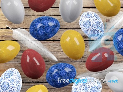 Easter Eggs And Bird Feathers On Wood Background Stock Image