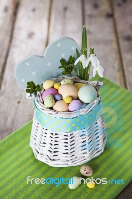 Easter Eggs In The White Basket Stock Photo