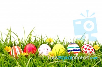 Easter Eggs On Grass Stock Photo