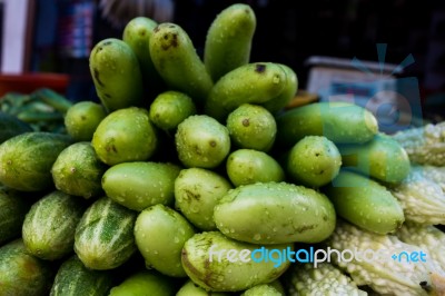 Egg Plant, Cucumbers, And Bitter Gourd In A Market In India Stock Photo
