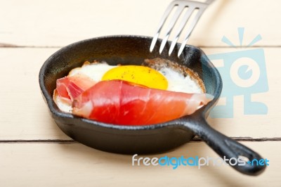 Egg Sunny Side Up With Italian Speck Ham Stock Photo