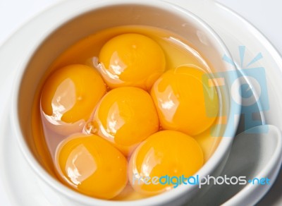 Eggs In White Bowl Stock Photo