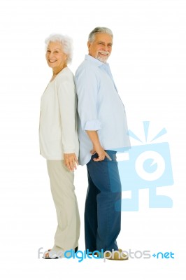 Elderly Couple Back To Back Stock Photo