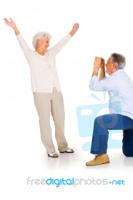 Elderly Couple Taking Photograph Stock Photo