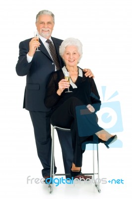 Elderly Couple Toasting Stock Photo