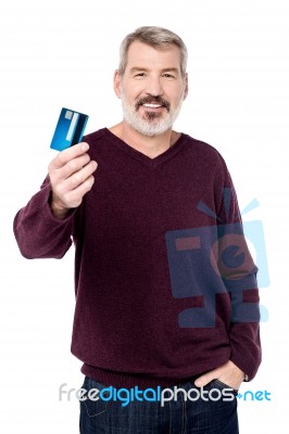 Elderly Guy Posing Stylishly With Credit Card Stock Photo