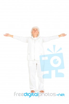 Elderly Woman Practicing Yoga Stock Photo