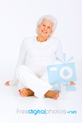 Elderly Woman Sitting Stock Photo