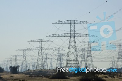 Electric Transmission Lines Lead Away Stock Photo