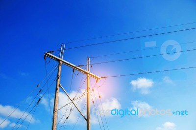 Electricity Poles With Blue Sky Stock Photo