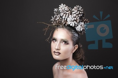 Elegant Girl In The New Year Wreath Of Pine Cones Stock Photo