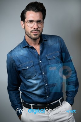 Elegant Young Handsome Man. Studio Fashion Portrait Stock Photo