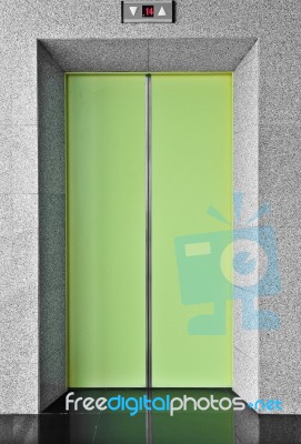 Elevator With Green Door Stock Photo
