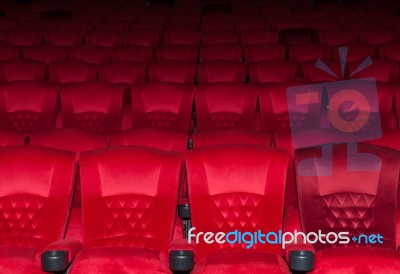 Empty Comfortable Red Seats In Thearter Stock Photo