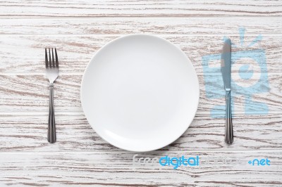 Empty Plate Fork Knife Silverware White Wooden Table Background Stock Photo