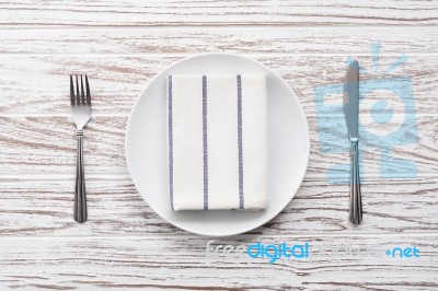 Empty Plate Napkin Fork Knife Silverware White Wooden Table Background Stock Photo