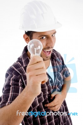 Engineer Showing Electric Bulb Stock Photo