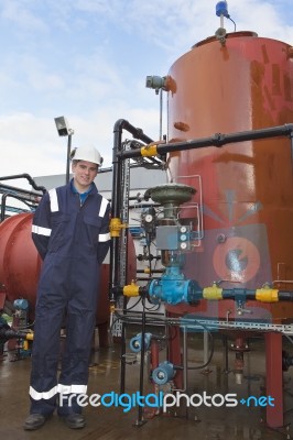 Engineer standing on Oil Refinery Stock Photo