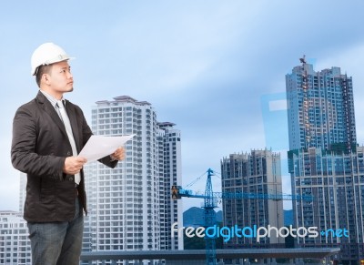 Engineering Man Wearing Western Suit And Safety Helmet With Buil… Stock Photo