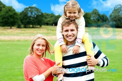 Enjoying Family In Park Stock Photo