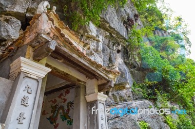 Entrance To A Buddhist Cave Temple In Vietnam Stock Photo