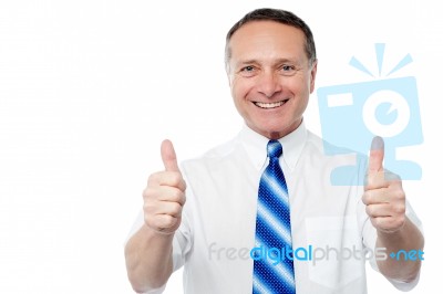 Entrepreneur Showing Double Thumbs Up Stock Photo