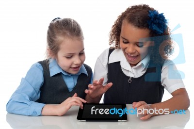 Excited Kids Using Tablet Pc Stock Photo