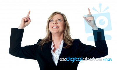 Executive Pointing Upwards Stock Photo