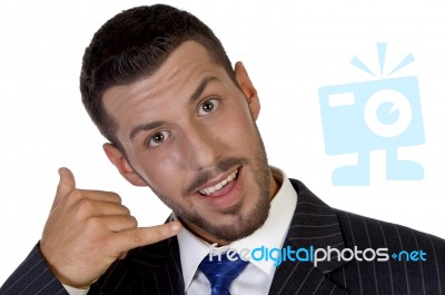 Executive Showing Telephone Hand Gesture Stock Photo