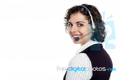 Executive Turning Back And Passing Smile To You Stock Photo
