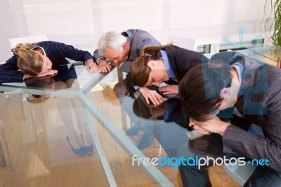Exhausted Business People Stock Photo
