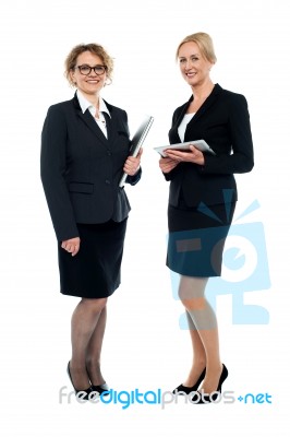 Experienced Corporate Ladies Interacting Stock Photo