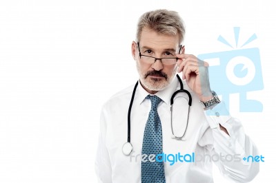 Experienced Male Doctor Isolated Over White Stock Photo
