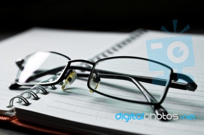 Eyeglasses On Diary Stock Photo