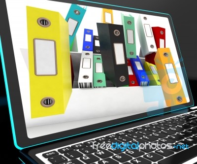 Falling Files On Laptop Showing Unorganized Stock Image