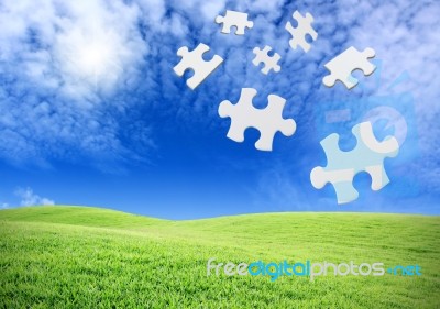 Falling Puzzle Pieces Stock Photo