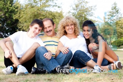 Family Having Fun In Countryside Stock Photo