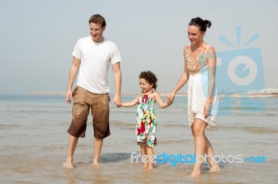 Family  In The Beach Stock Photo